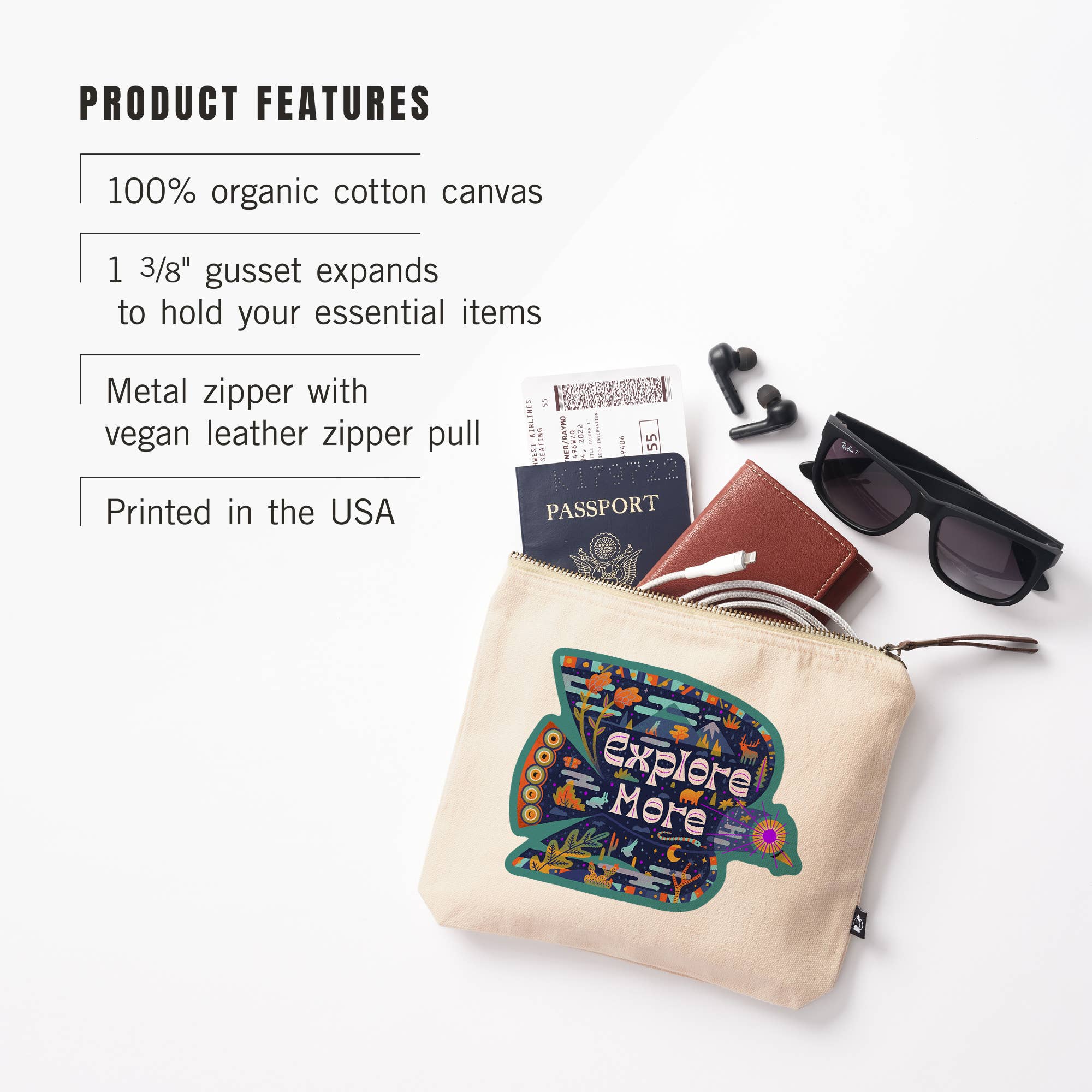 A canvas zip pouch with a colorful turtle graphic reading 'Explore More' is shown on a white background with product feature text on the left. The pouch is styled with travel accessories including a passport, earbuds, sunglasses, and a wallet.