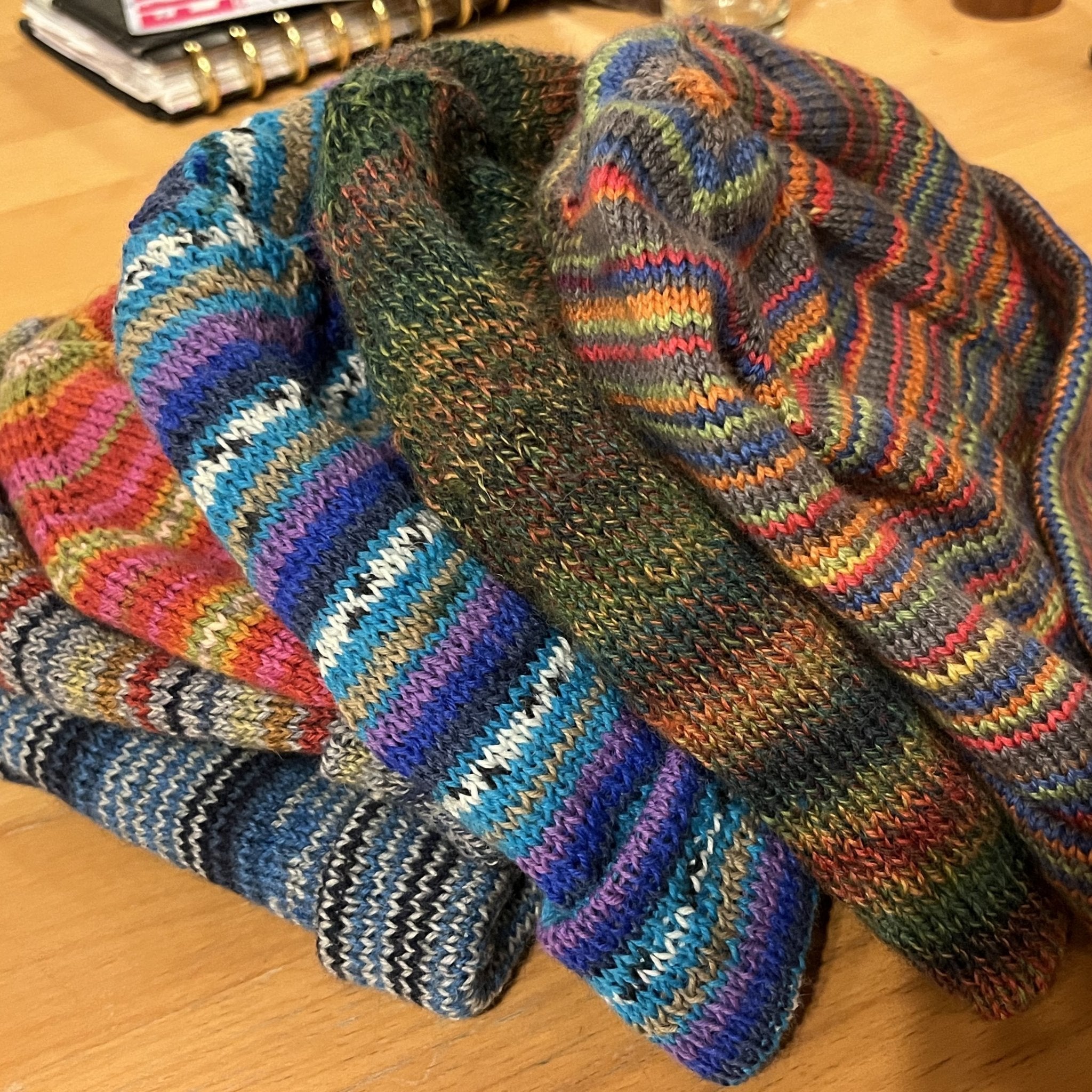 a stack on hand knit musselburgh hats
